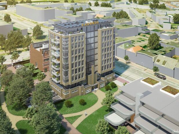 Het badhuis in Hengelo. Projectontwikkelaar Domain wil er een woontoren bovenop bouwen